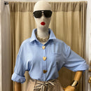 Camicia bottoni
