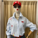 Camicia ricami